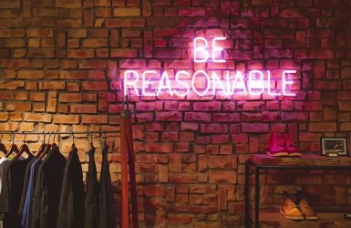 Be Reasonable neon signage